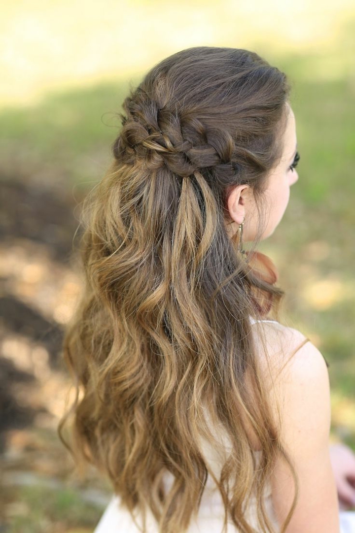 middle age hairstyles, brown and blonde wavy ombre hair, decorated with two rows of braids at the top, worn by woman in white dress