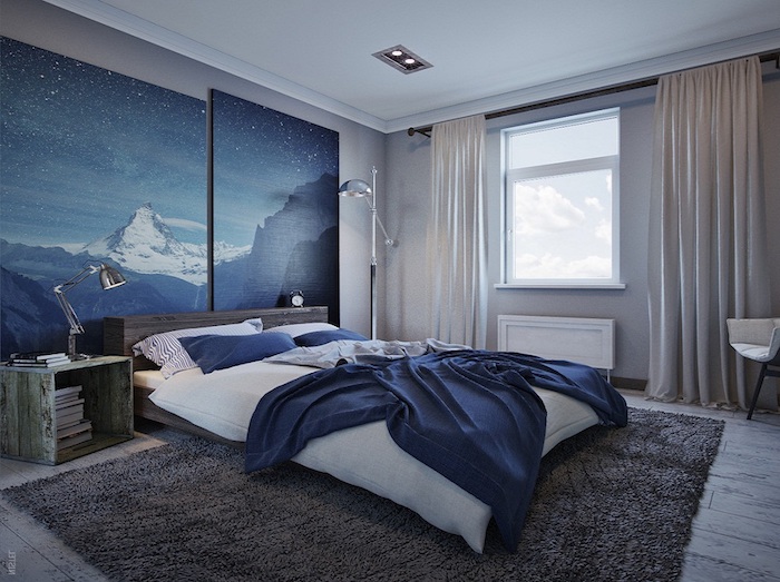 blue and white mountains, and a dark starry sky, painted on two large canvases, mounted on a bedroom wall, wall art décor 
