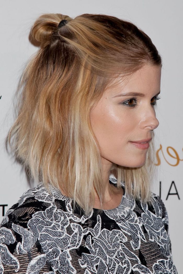 half bun or hun, worn by kate mara, blonde half up style, short hairstyles for fine hair, wearing a black top, with white floral embroidery