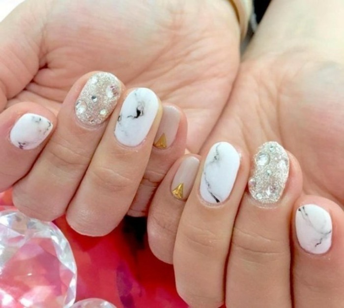Nail Ideas With Jewels rhinestone nail art two hands with differently colored nails white and grey marble effect 100 ideas for nails with rhinestones trendy in 2017