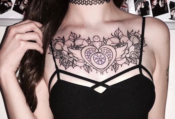symmetrical tattoo with heart and birds, chest tattoos for women, black top and necklace