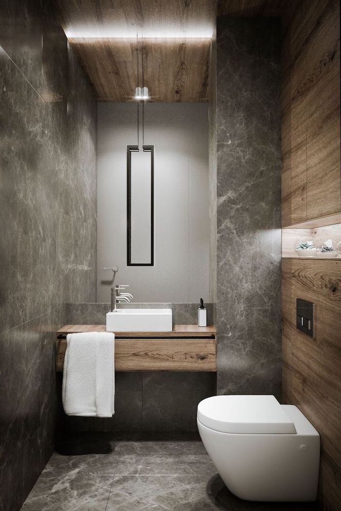 grey marble tiled walls and floor, bathroom remodel ideas, wooden floating shelves