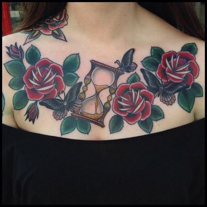 hourglass with butterflies, red roses with green leaves, small chest tattoos, black top