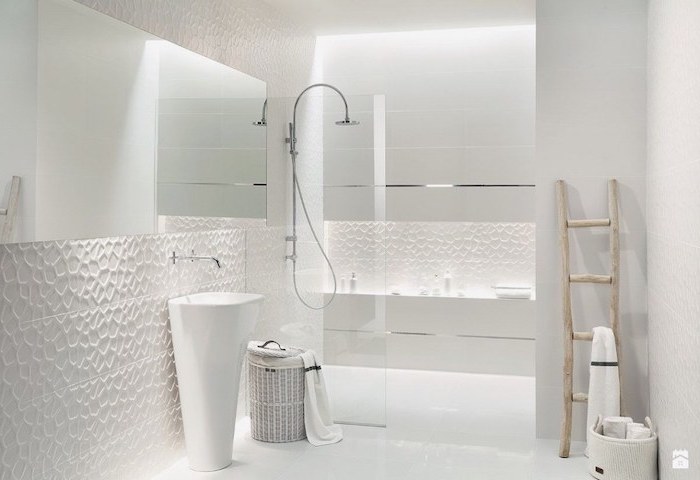 white 3d tiled walls, white cabinets and oval sink, modern bathroom design, large window