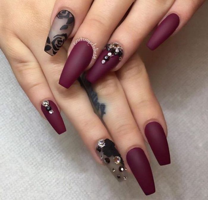 burgundy matte nail polish, simple nail designs, flowers drawn with black matte nail polish, with rhinestones