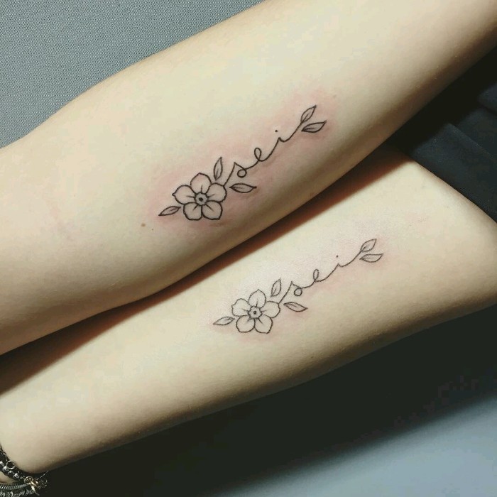 grey background, flower tattoos, forearm tattoos, matching tattoo ideas