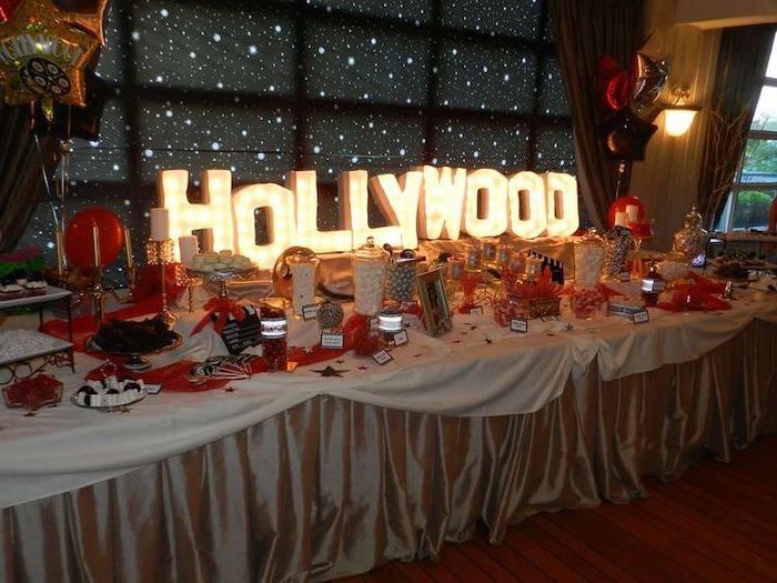 hollywood lights sign, black red and gold, fun birthday ideas, candies and sweets, in large jars