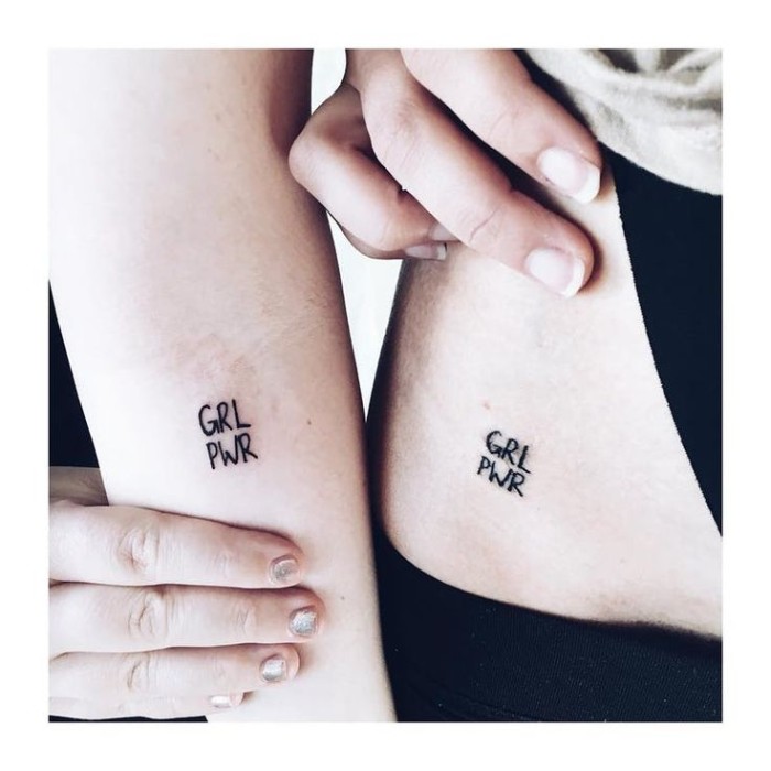 grl pwr, forearm tattoo, hip tattoo, small friendship tattoos, feminist message