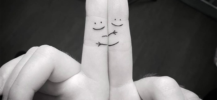 stick figures hugging, finger tattoos, best friend symbol tattoos, black and white photo