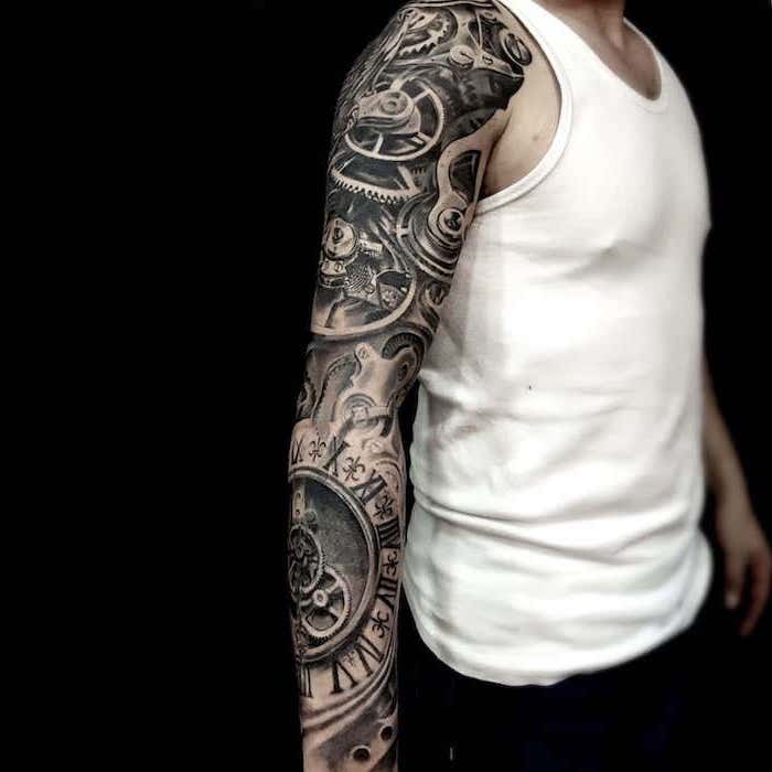 white top, black background, lion tattoo sleeve, biomechanical clock