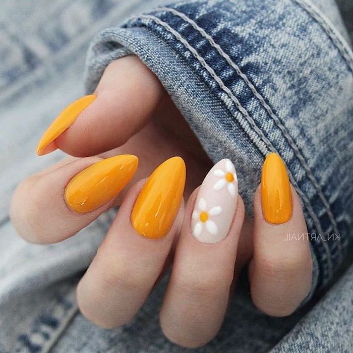 denim jacket, orange nail polish, white daisies, nail color ideas
