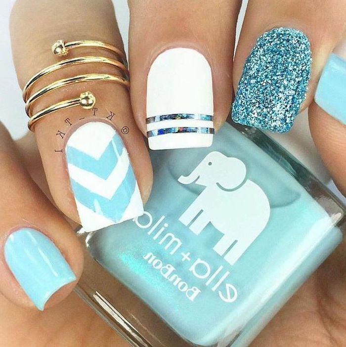 white and blue, blue glitter, nail polish, classy nail designs, gold ring, nail polish bottle