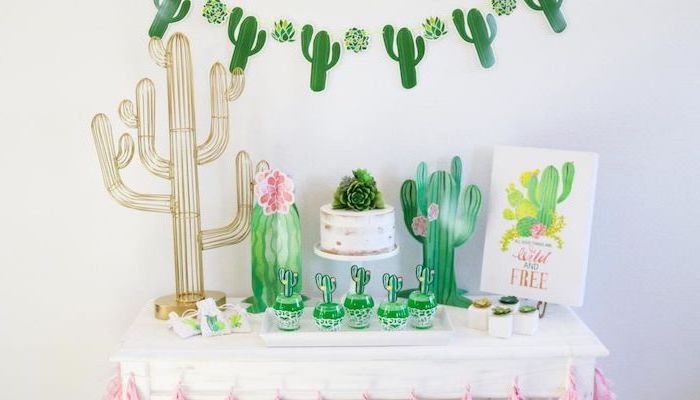 baby shower food ideas, cactus theme, wild and free, cupcakes on white plate, wooden table