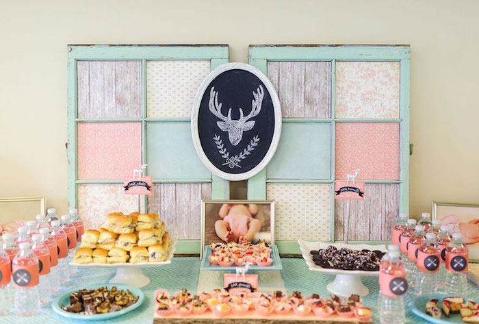 colorful decor, in pastel colors, baby shower food ideas, burgers and pretzels, cupcakes and cookies, water bottles