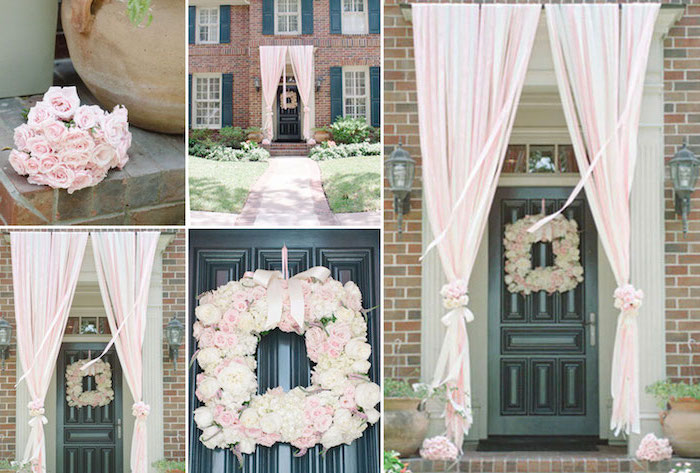 dinosaur baby shower, door decoration, roses floral wreath, pink tulle, hanging over the door