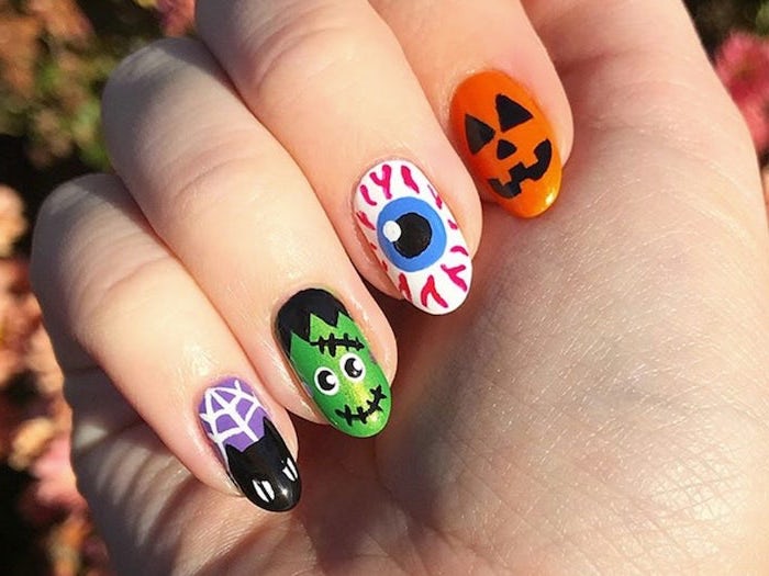 different decorations, red nails coffin, squoval nails, frankenstein and eye, cat and pumpkin