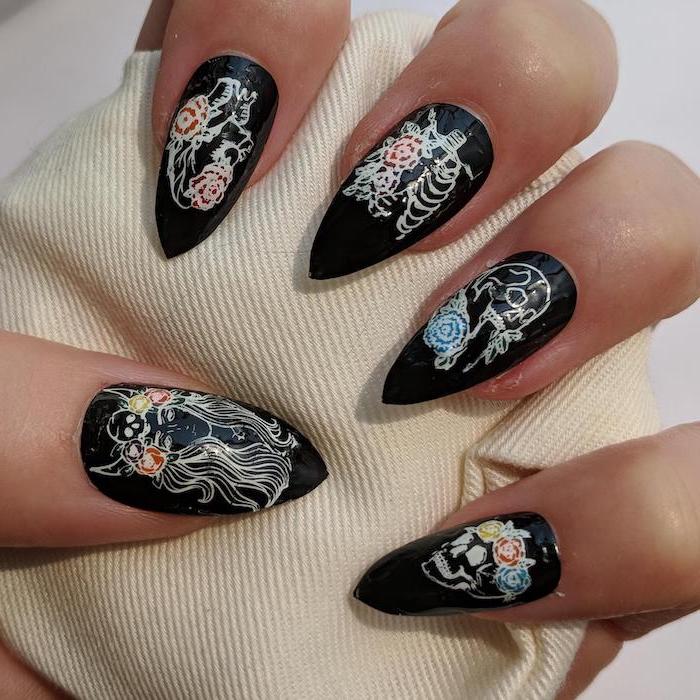 black nail polish, body parts, floral decorations, cute acrylic nail ideas, stiletto nails, white background