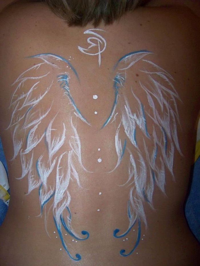 wings neck tattoo, white and blue colors, back tattoo, woman with brown hair