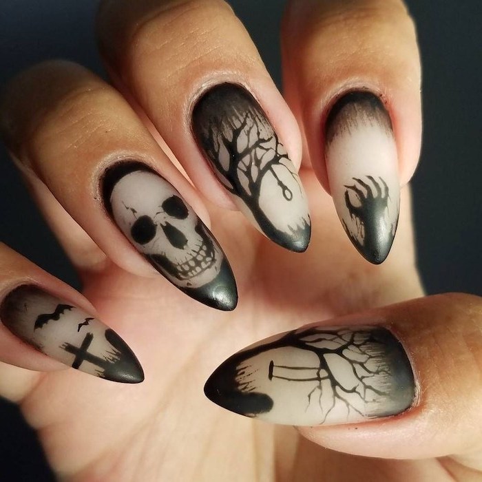 white matte nail polish, black cemetery decorations, skull and trees, black background, candy corn nails