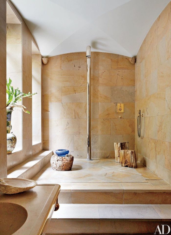 brown granite, tiled walls, cathedral ceiling, half barrel ceiling in white, wooden logs, shower head
