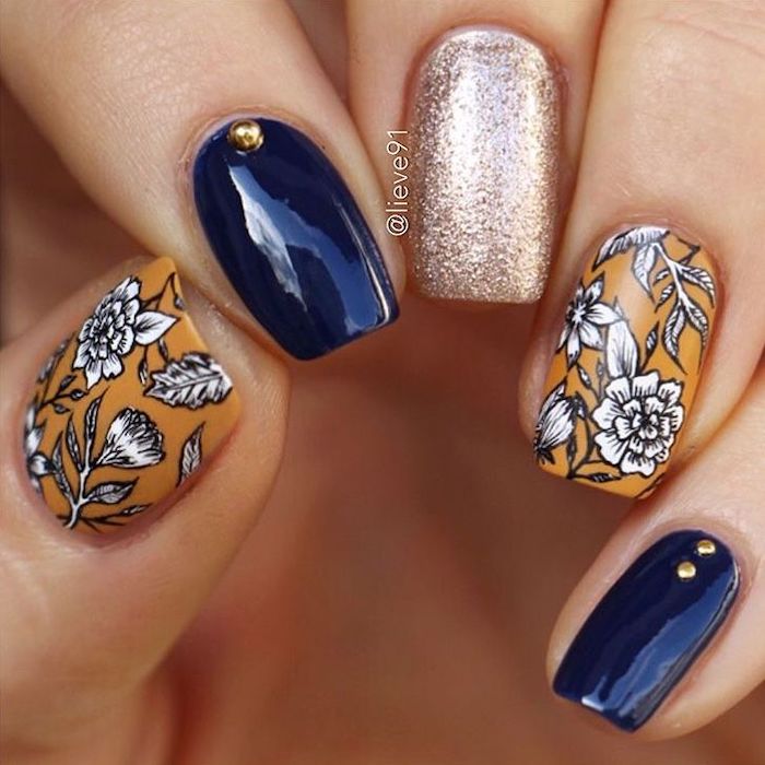 blue and orange, nail polish, trending nail colors, silver glitter, white flowers, nail decorations, square nails