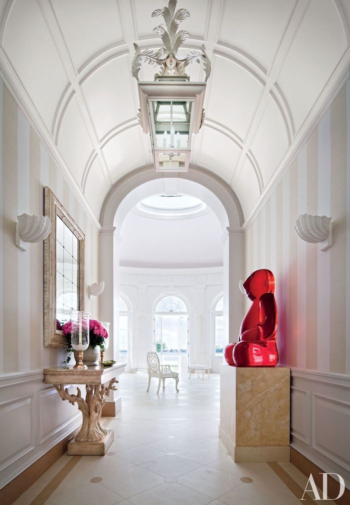 barrel ceiling, white hallway, vaulted ceiling lighting, pink roses, flower bouquet, pink glass teddy bear