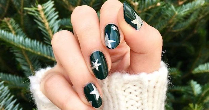 almond shaped nails, nail color ideas, green nail polish with silver glitter stars, star decorations on each nail
