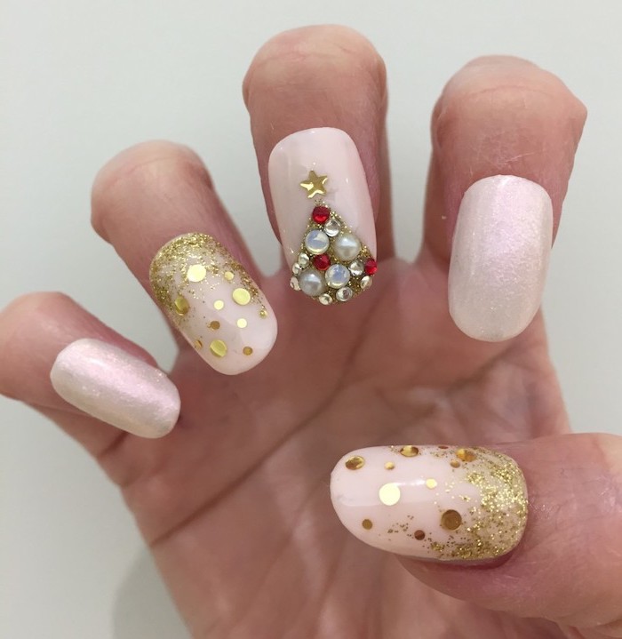 white glitter nail polish, pretty nail colors, gold glitter on thumb and ring finger, rhinestone christmas tree on middle finger