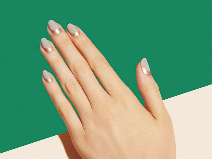 grey matte nail polish, gold metallic lines at the bottom of the nail, pretty nail colors, short squoval nails