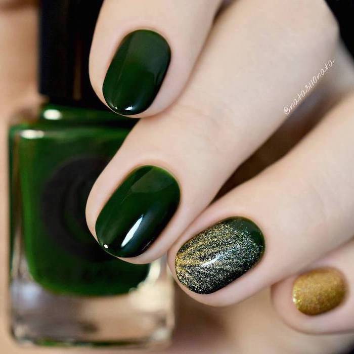 dark green nail polish, nude nail designs, gold glitter on pinky and ring finger, nude nail designs, almond nails